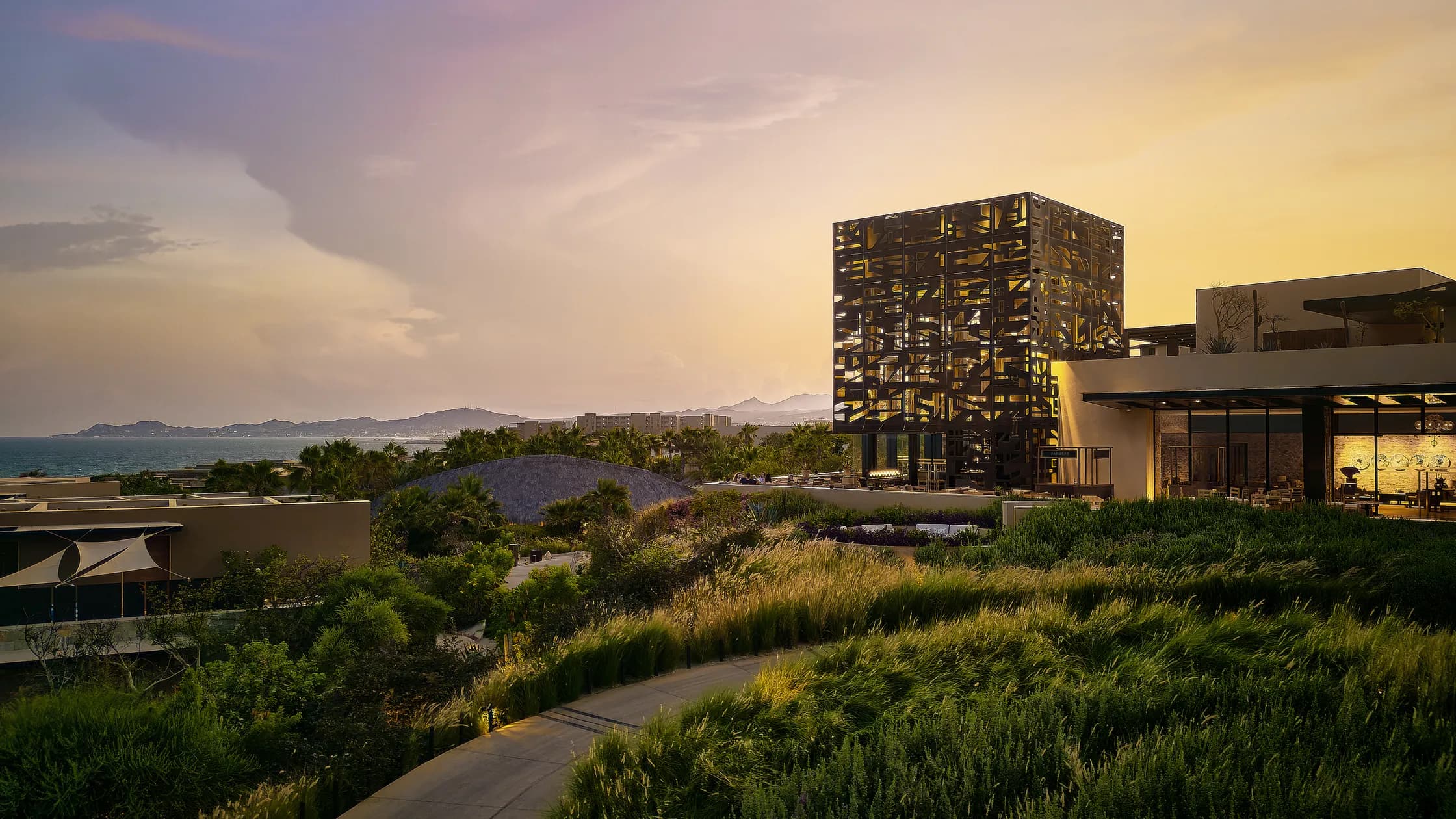 Zadún, a Ritz-Carlton Reserve — the Candil tower illuminated at sunset against the Baja desert sky