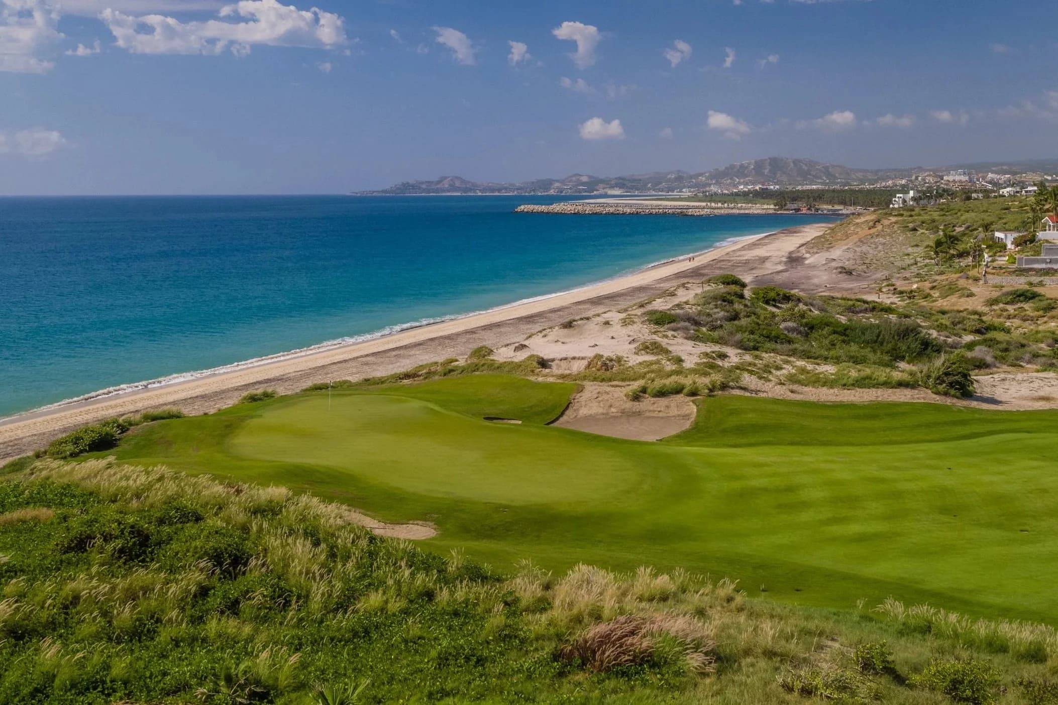 Puerto Los Cabos golf community — 27 holes designed by Greg Norman and Jack Nicklaus with marina, beach clubs, and botanical gardens near San José del Cabo