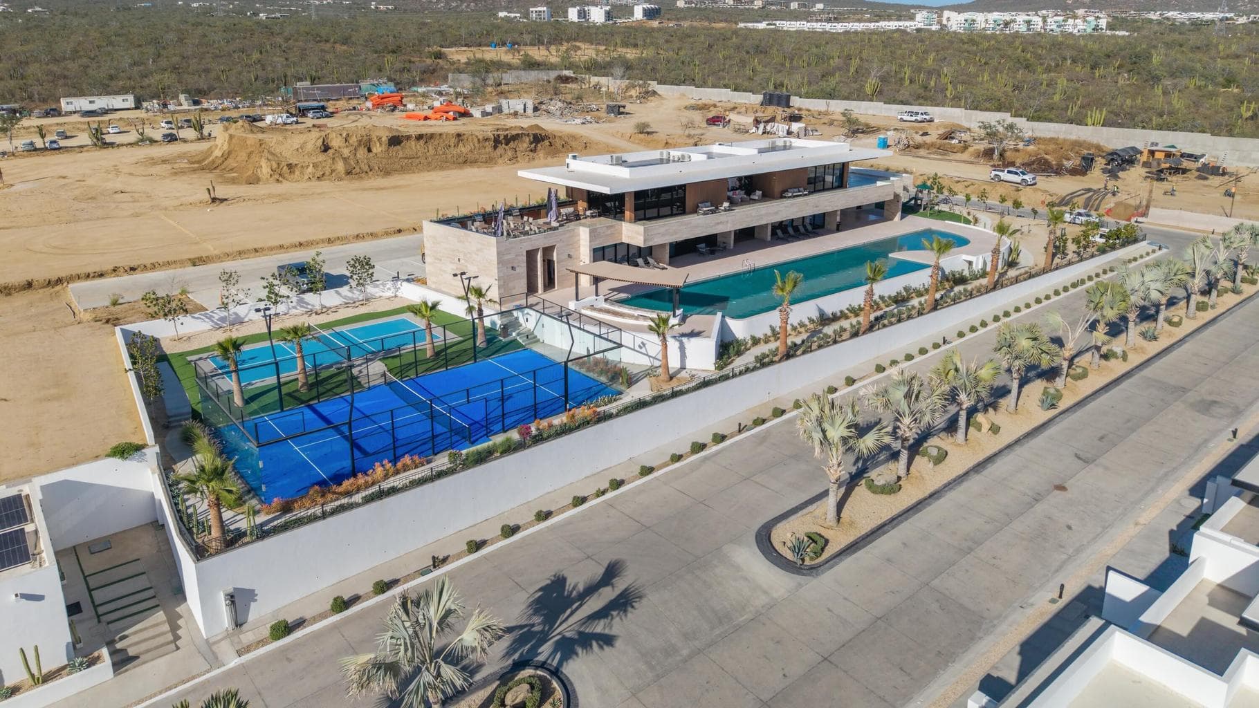 Professionally managed Cabo San Lucas vacation rental interior — luxury condo amenities with ocean view terrace driving short-term rental revenue and ROI
