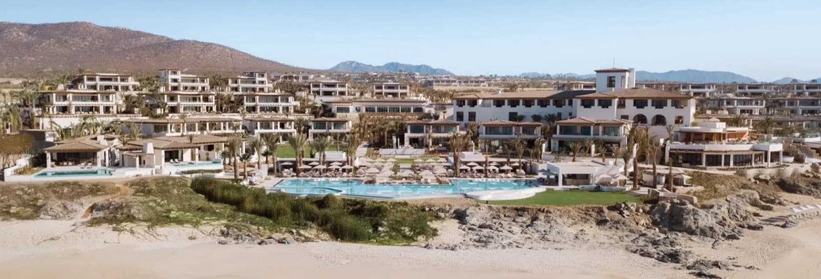 Beachfront resort and residences with pools on the sand at Cabo del Sol
