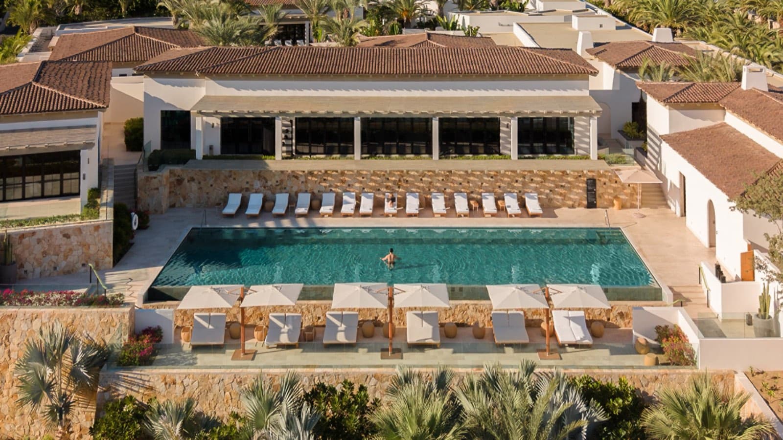 Aerial view of a club pool and terraces at Cabo del Sol, Los Cabos