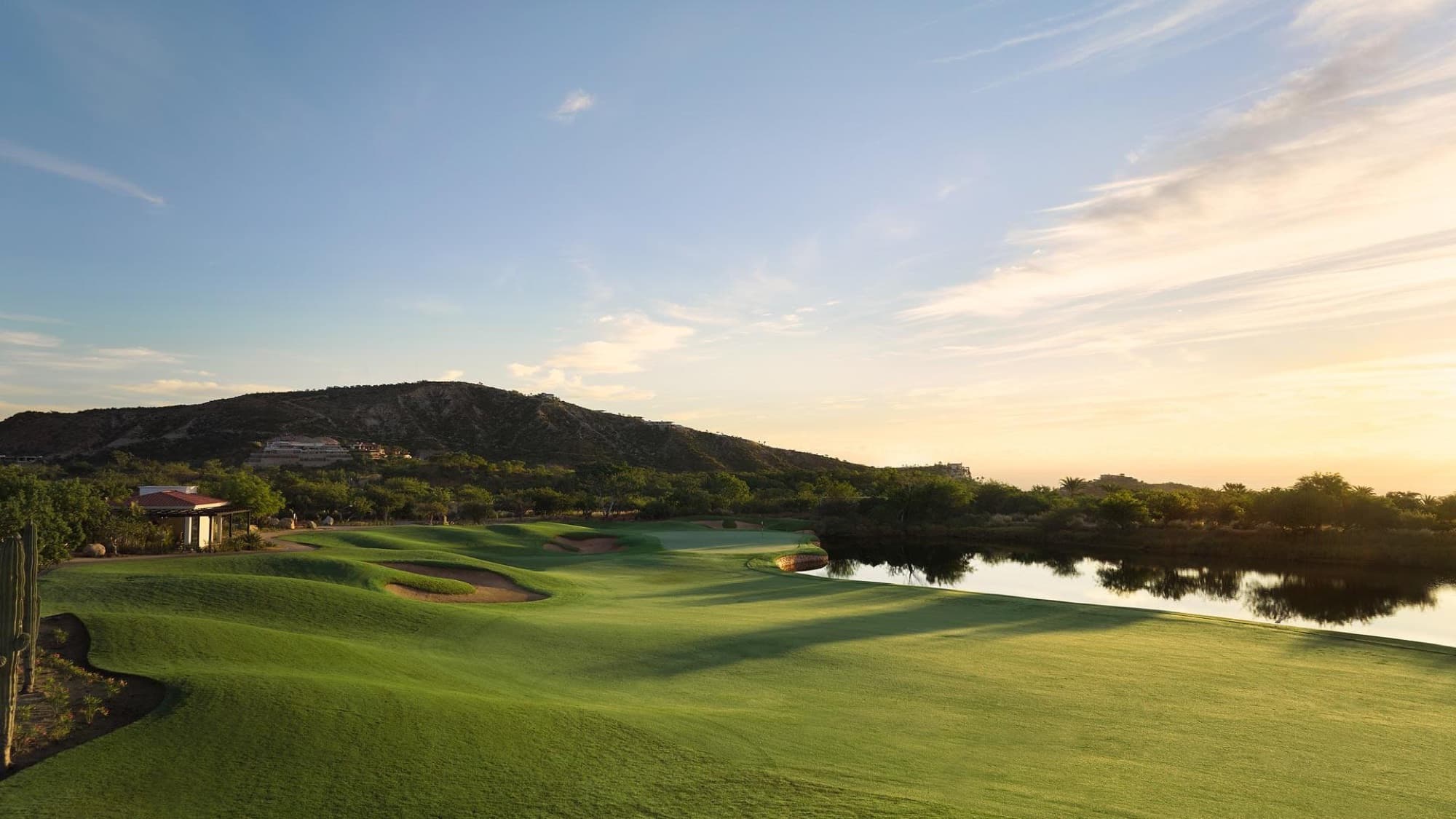 Palmilla Golf Club fairway and lake at sunset, Los Cabos